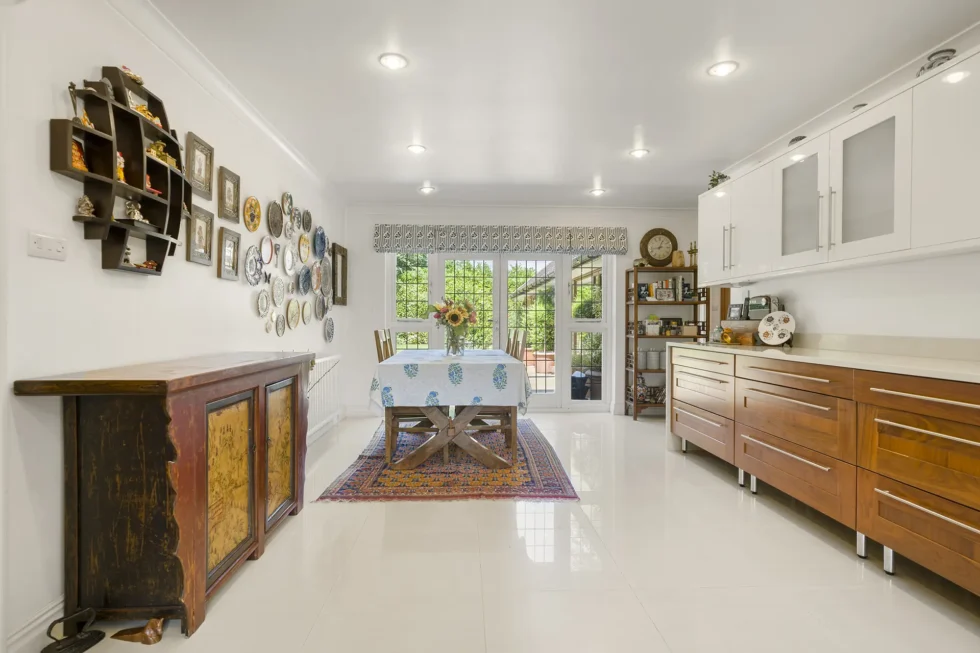 Family dining area at the garden end of the kitchen, with French doors opening to the terrace